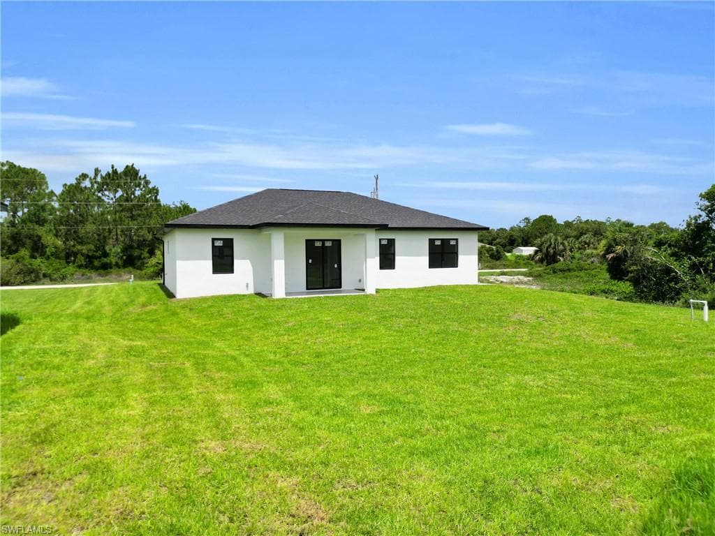 825 Frederick Reid St E, Lehigh Acres, FL 33971-4