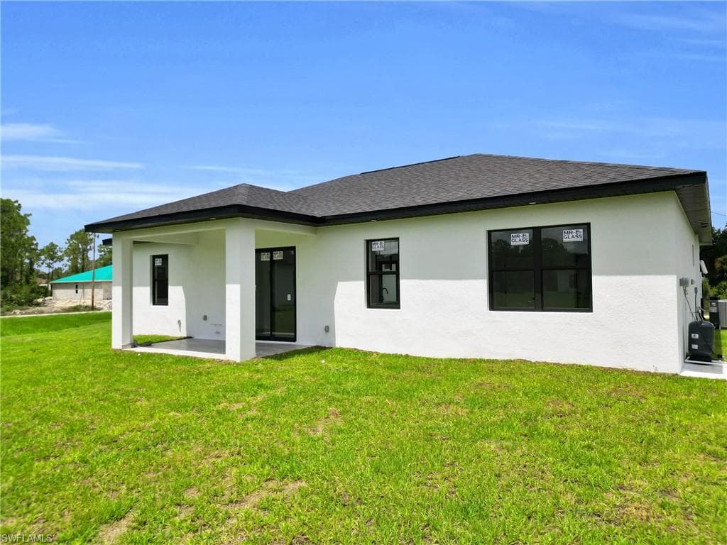 825 Frederick Reid St E, Lehigh Acres, FL 33971-5