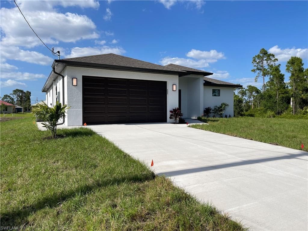 1137 Damen St E, Lehigh Acres, FL 33974-3