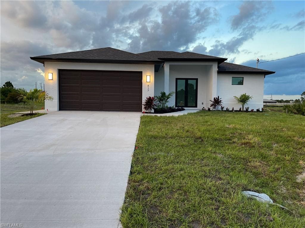 817 Newell St E, Lehigh Acres, FL 33974-1