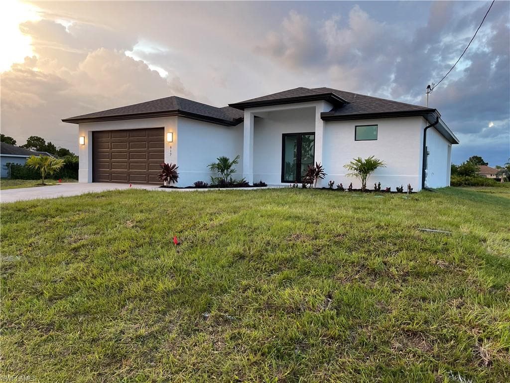 817 Newell St E, Lehigh Acres, FL 33974-3