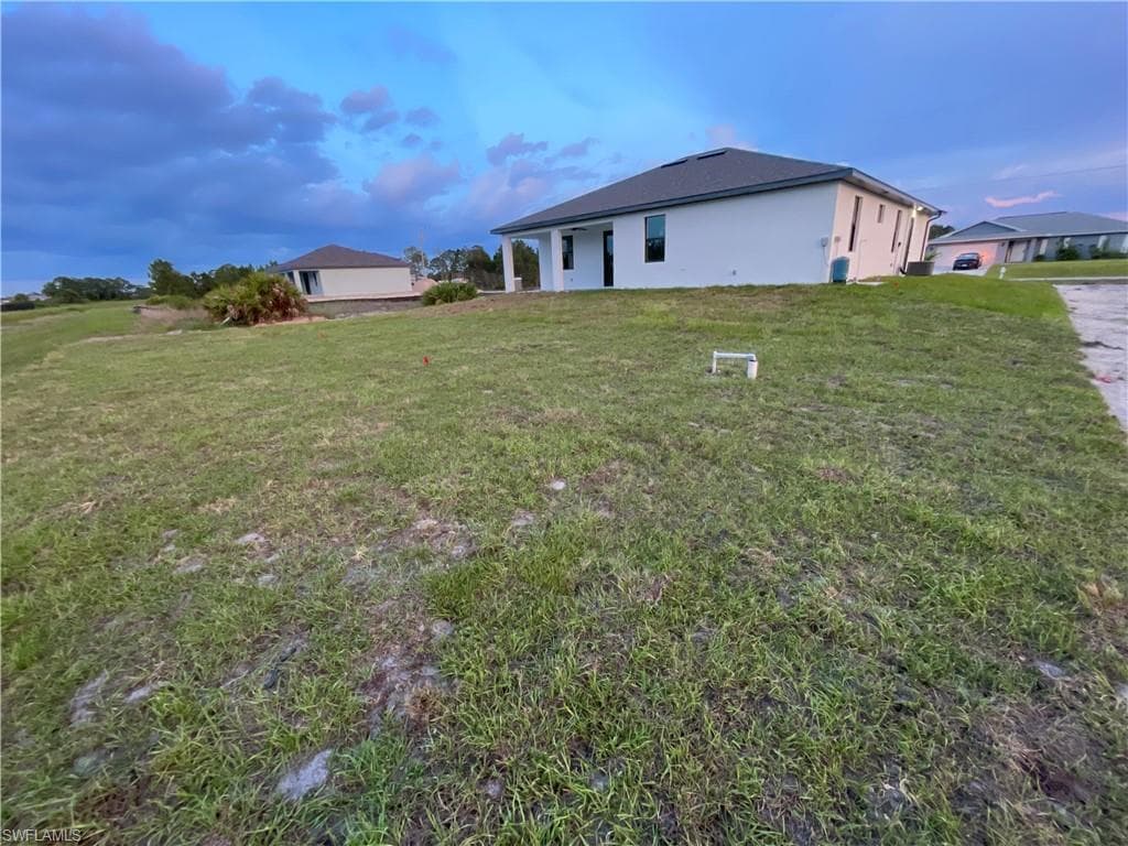 817 Newell St E, Lehigh Acres, FL 33974-6