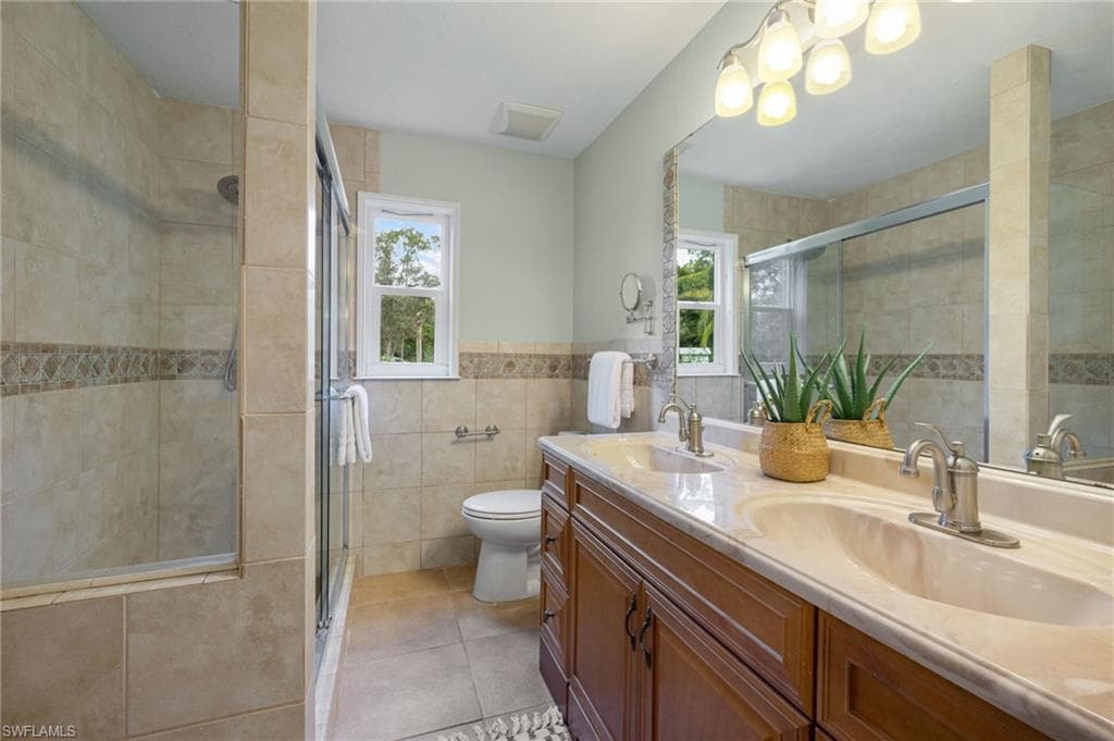 5141 Palmetto Woods Dr, Naples, FL 34119-34