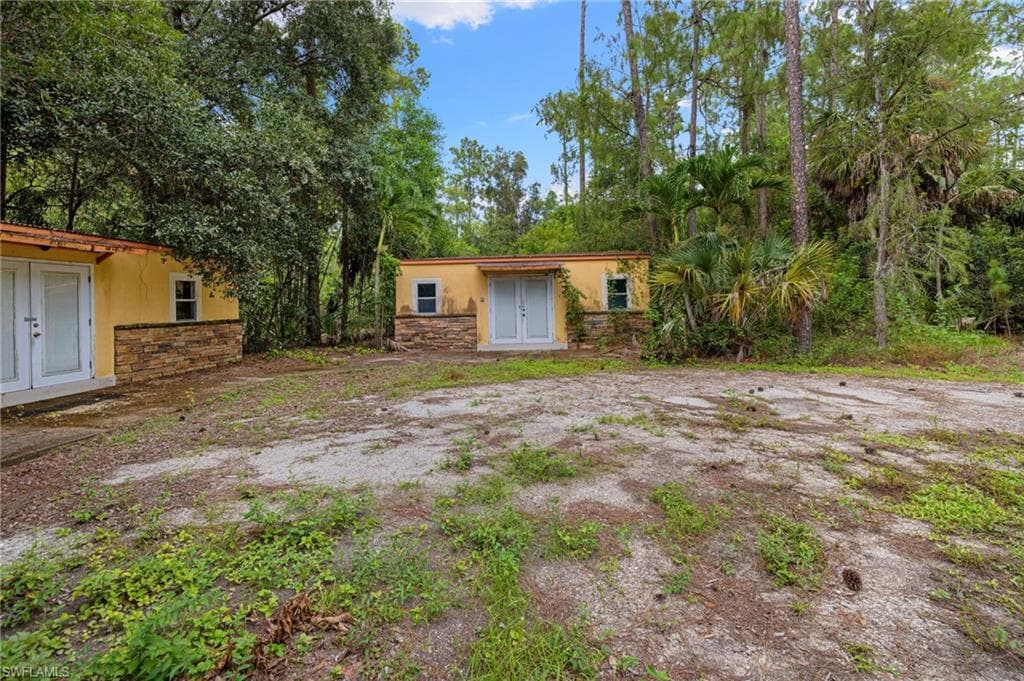 5141 Palmetto Woods Dr, Naples, FL 34119-47