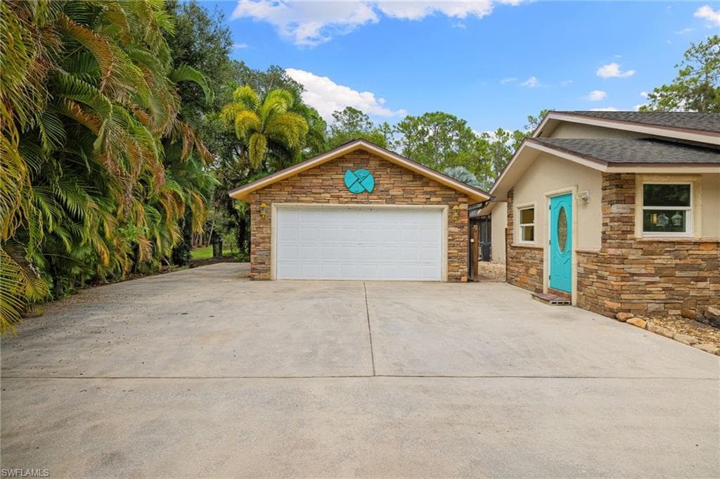5141 Palmetto Woods Dr, Naples, FL 34119-5
