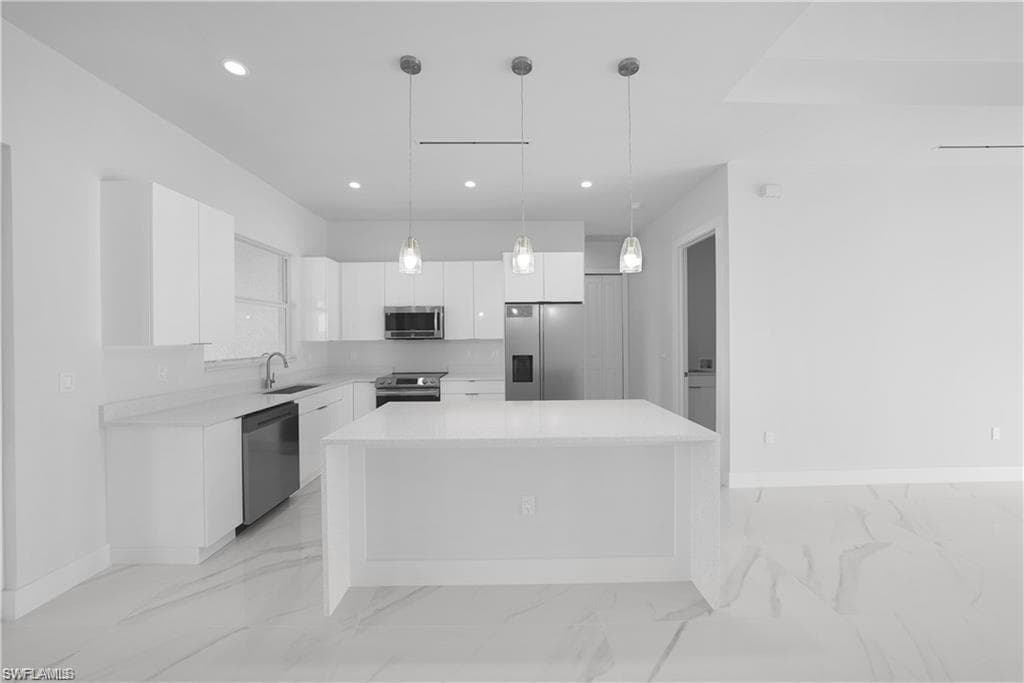 121 8th Ter, Cape Coral, FL 33909-37