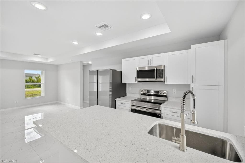 321 Ranier Ave, Lehigh Acres, FL 33974-9