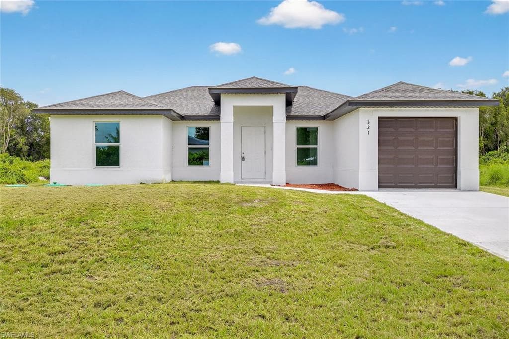 321 Ranier Ave, Lehigh Acres, FL 33974-2
