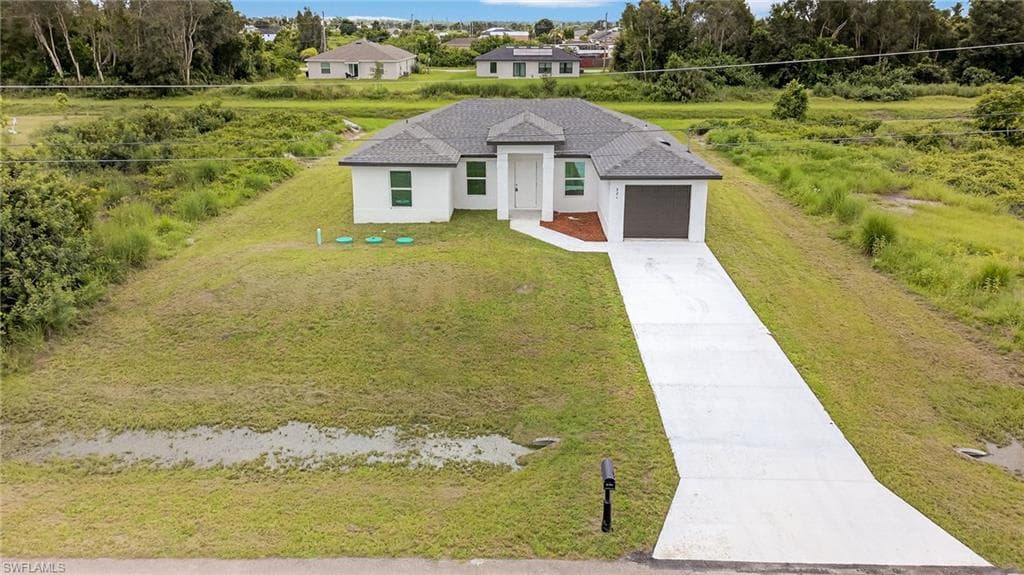 321 Ranier Ave, Lehigh Acres, FL 33974-32