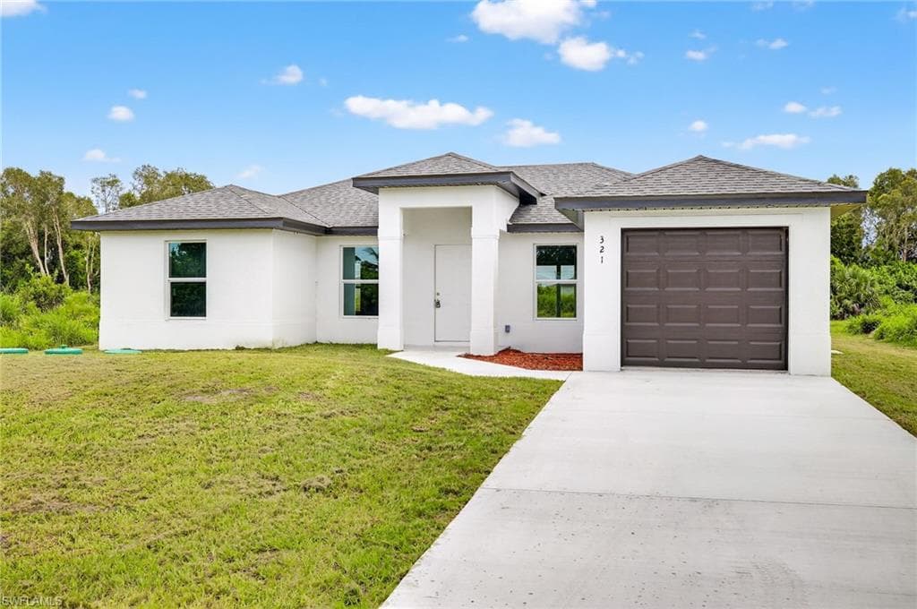 321 Ranier Ave, Lehigh Acres, FL 33974-3