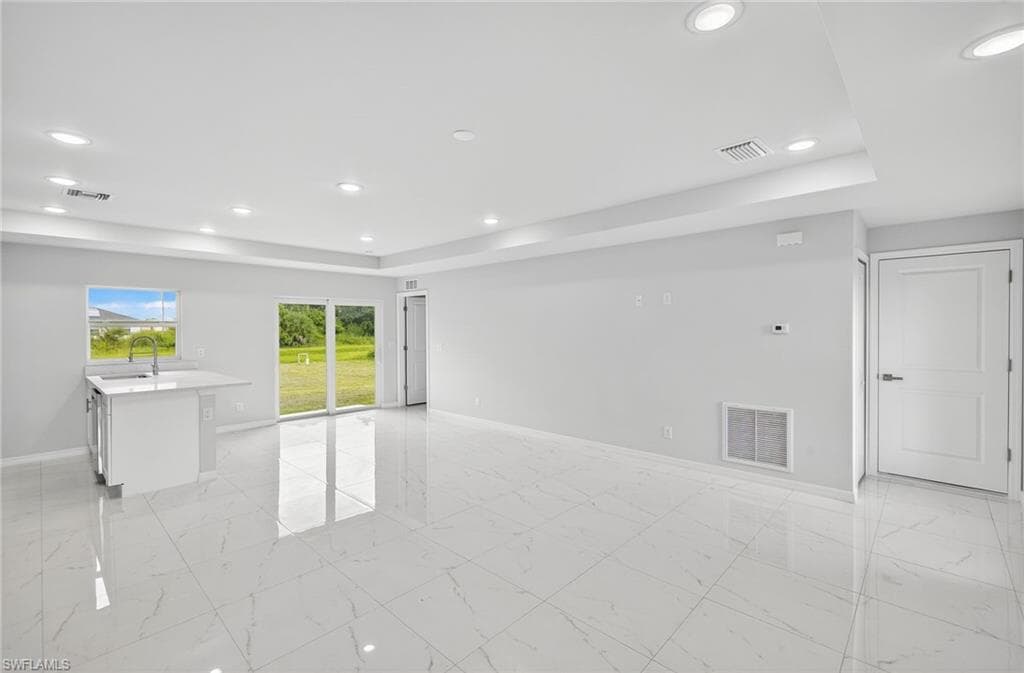 321 Ranier Ave, Lehigh Acres, FL 33974-5