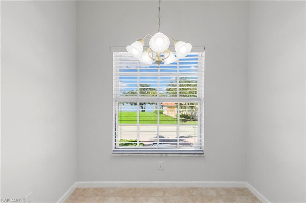 25050 Peacock Ln 201, Naples, FL 34114-8