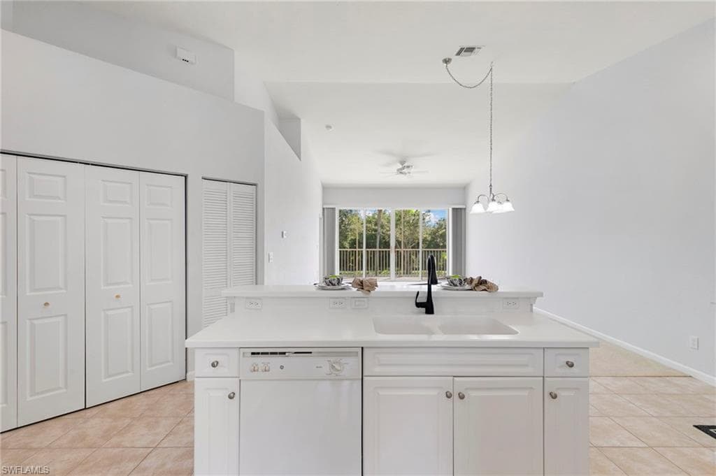 25050 Peacock Ln 201, Naples, FL 34114-12