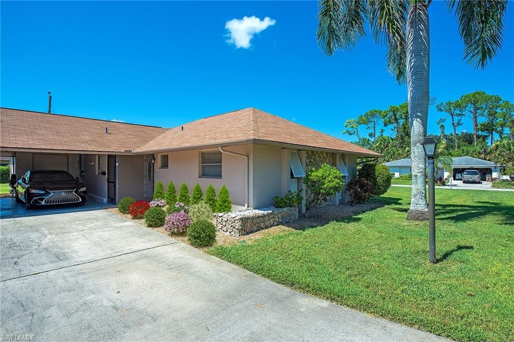 287 Rosewood Ct, Lehigh Acres, FL 33936-2