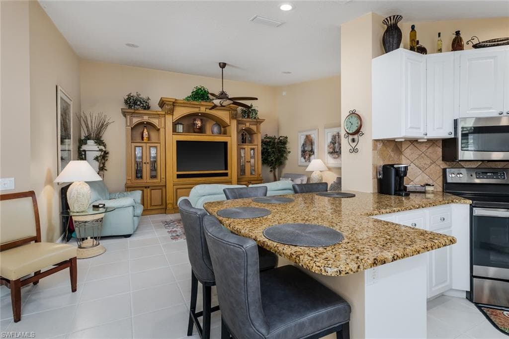 4873 Lasqueti Way, Naples, FL 34119-13