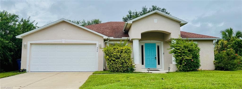 320 Laurel Ave, Lehigh Acres, FL 33974-1