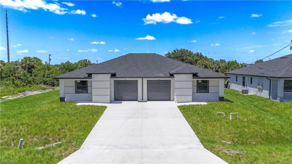 843 Duplex St E, Lehigh Acres, FL 33974-2