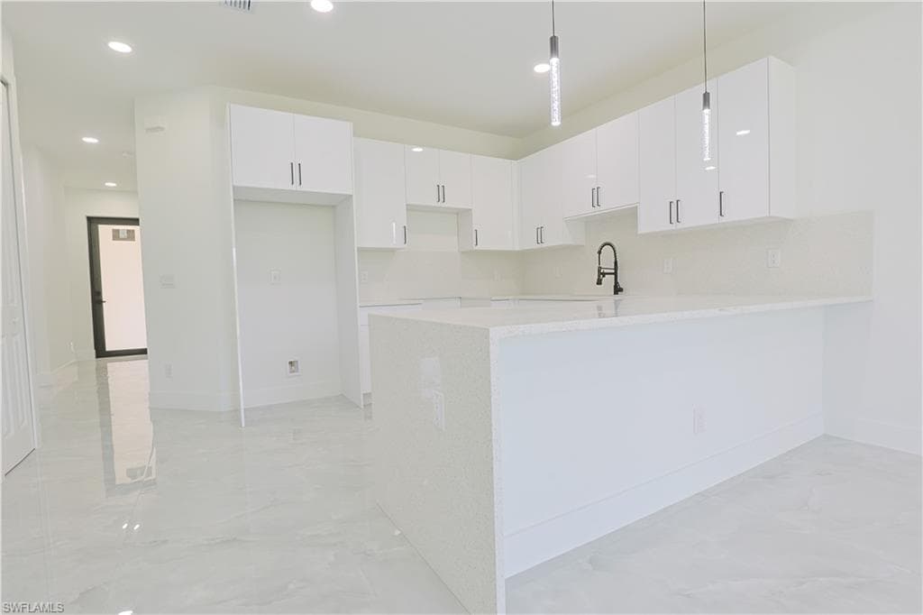 843 Duplex St E, Lehigh Acres, FL 33974-6