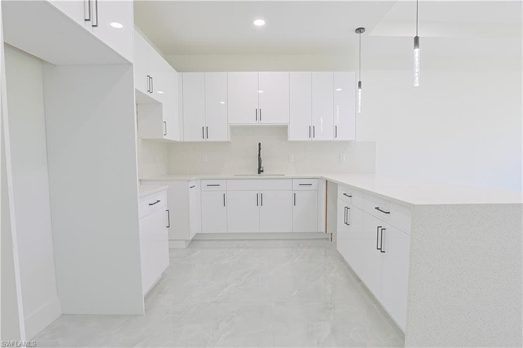 843 Duplex St E, Lehigh Acres, FL 33974-7