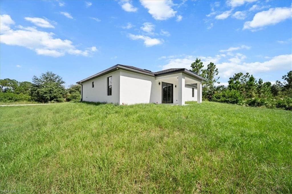 1915 Scott Ave, Lehigh Acres, FL 33972-4