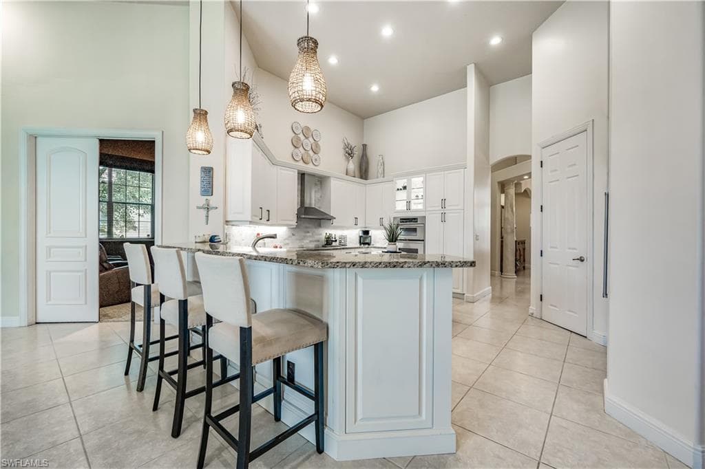 412 Terracina Way, Naples, FL 34119-9