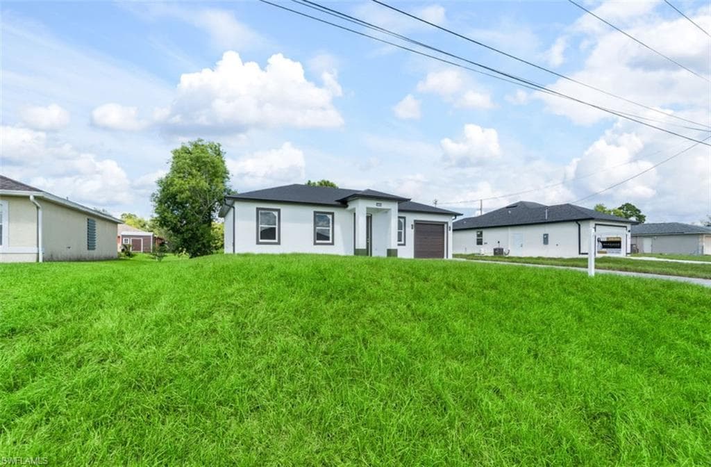 722 Castlestone Ave S, Lehigh Acres, FL 33974-3