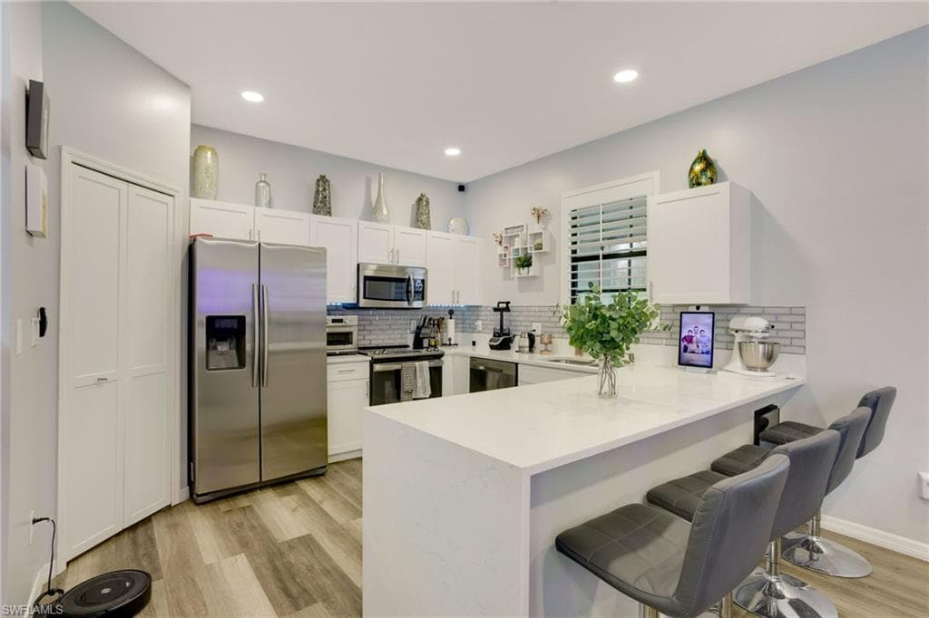 15659 Summit Place Cir, Naples, FL 34119-6