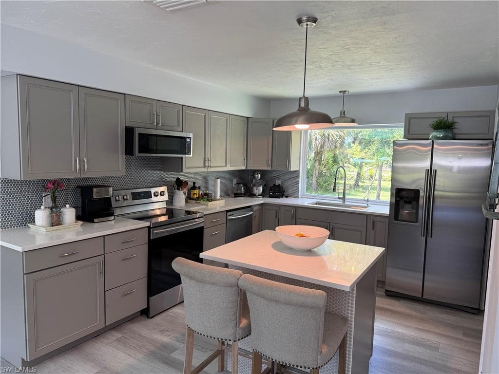 310 14th St SE, Naples, FL 34117-18