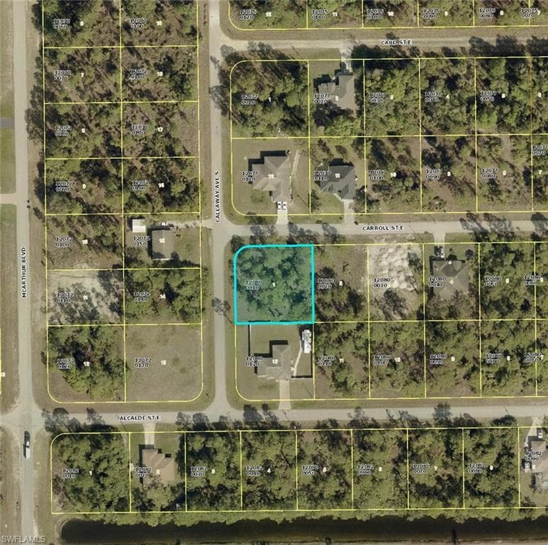 1016 Carroll St E, Lehigh Acres, FL 33974-3
