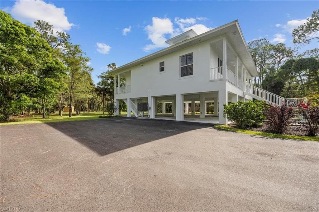 1041 20th Ave NE, Naples, FL 34120-23