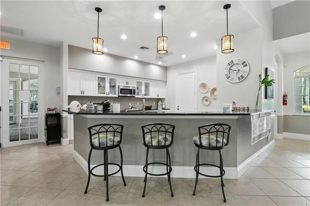 8244 Ibis Cove Cir, Naples, FL 34119-29