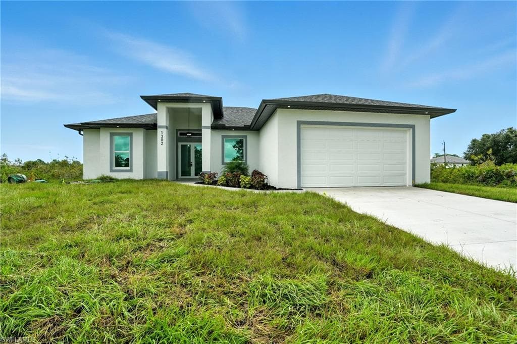 1302 Plumosa Ave, Lehigh Acres, FL 33972-3