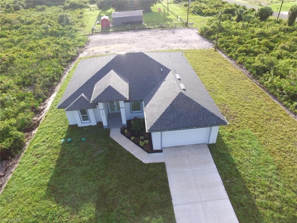 1302 Plumosa Ave, Lehigh Acres, FL 33972-4