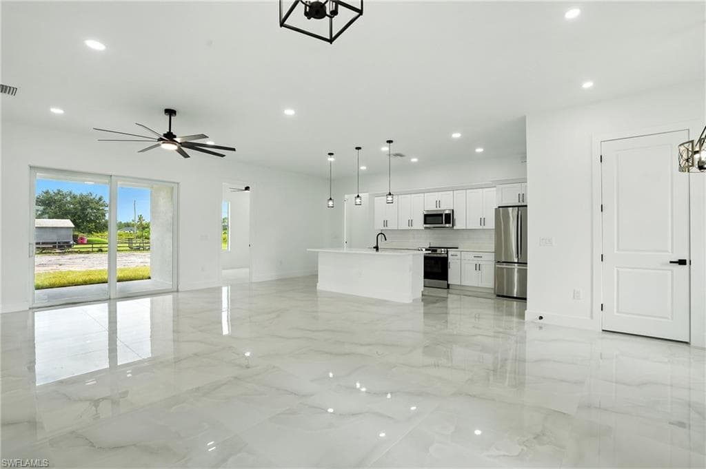1302 Plumosa Ave, Lehigh Acres, FL 33972-8