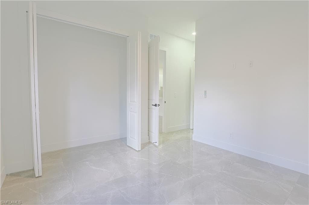 1023 Loyal Ave S, Lehigh Acres, FL 33974-9