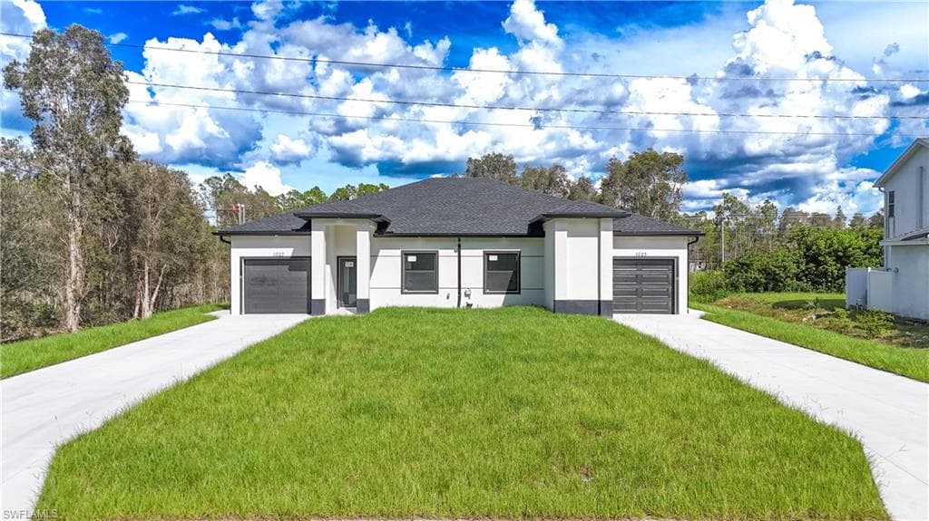 1023 Loyal Ave S, Lehigh Acres, FL 33974-1