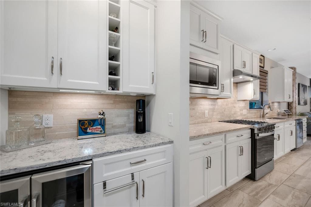 7457 Winding Cypress Dr, Naples, FL 34114-3