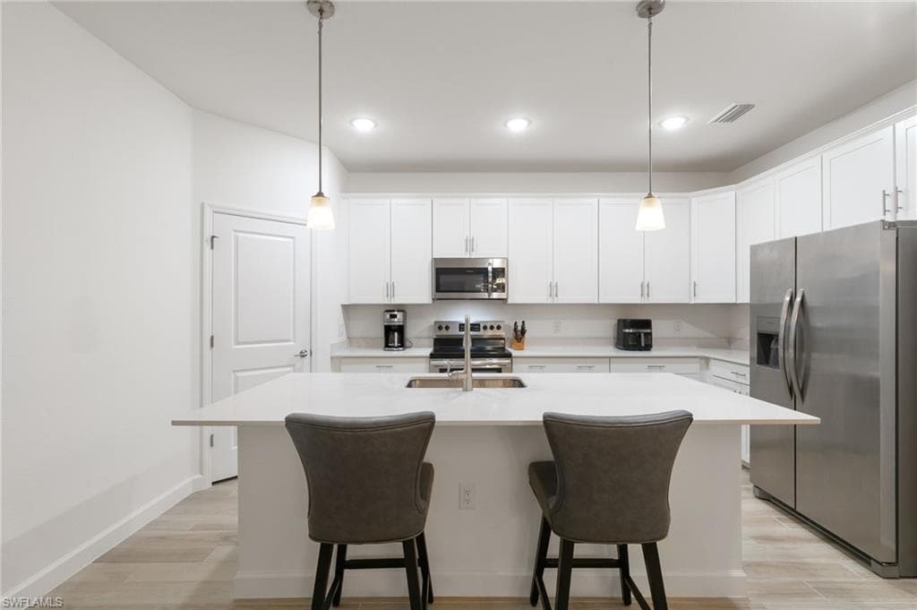 1473 Birdie Dr, Naples, FL 34120-12