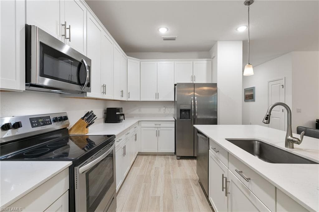 1473 Birdie Dr, Naples, FL 34120-14