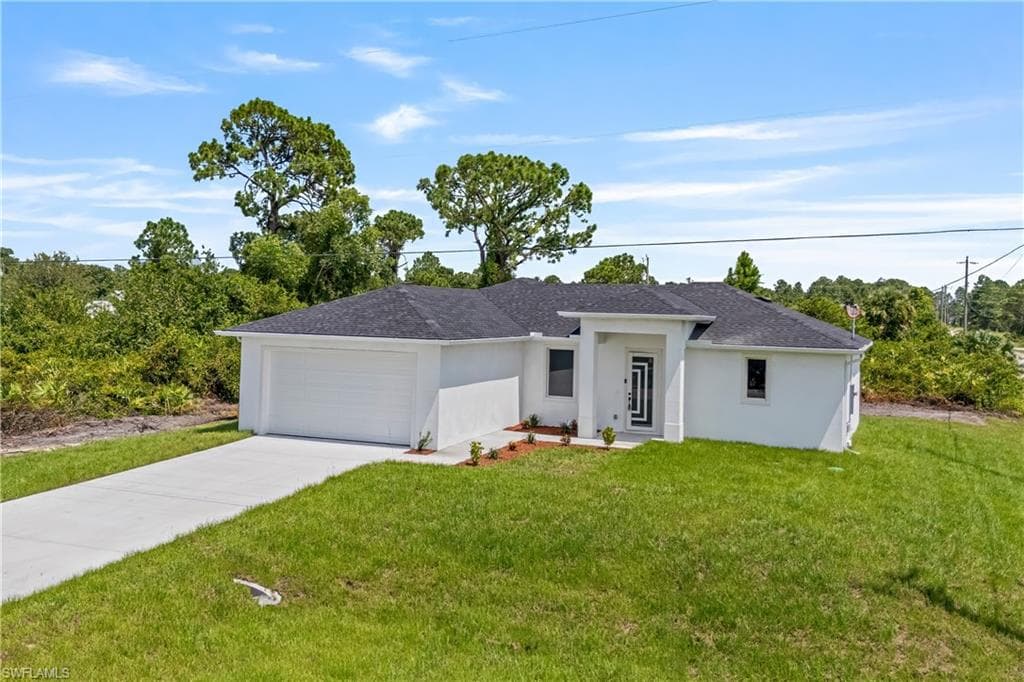 938 Grant Blvd, Lehigh Acres, FL 33974-3