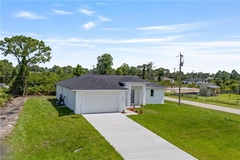 938 Grant Blvd, Lehigh Acres, FL 33974-4