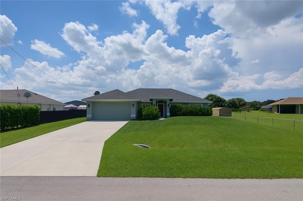 1909 Richland Ave, Lehigh Acres, FL 33972-9