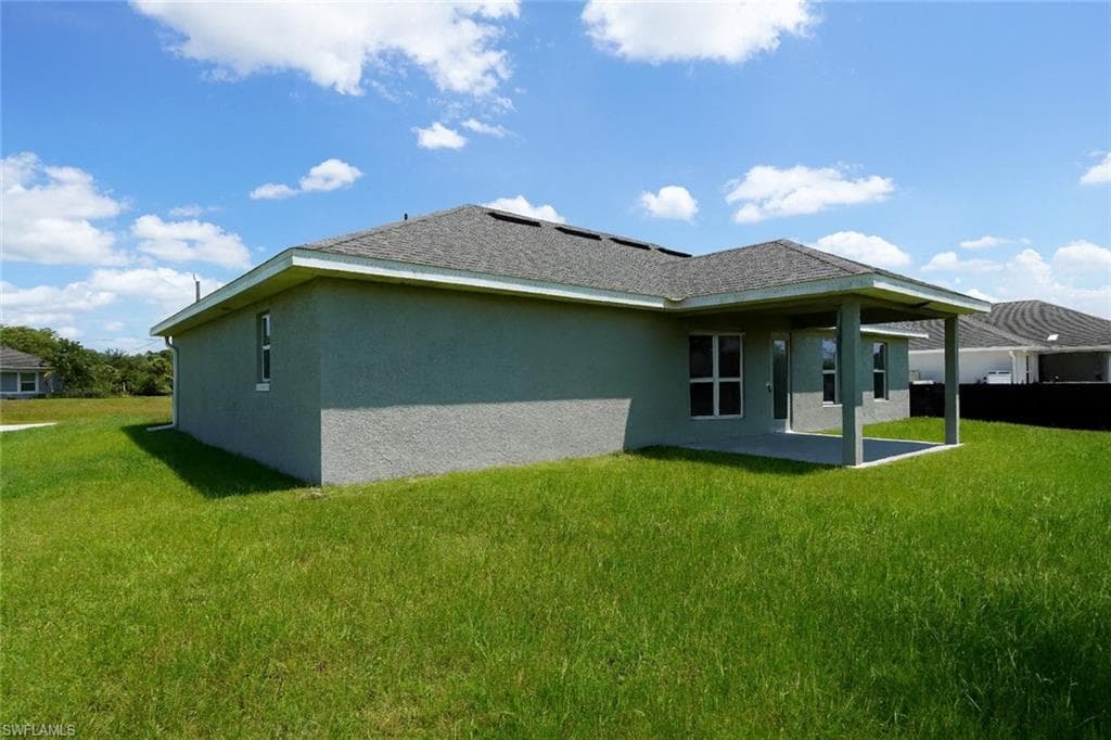 1909 Richland Ave, Lehigh Acres, FL 33972-8