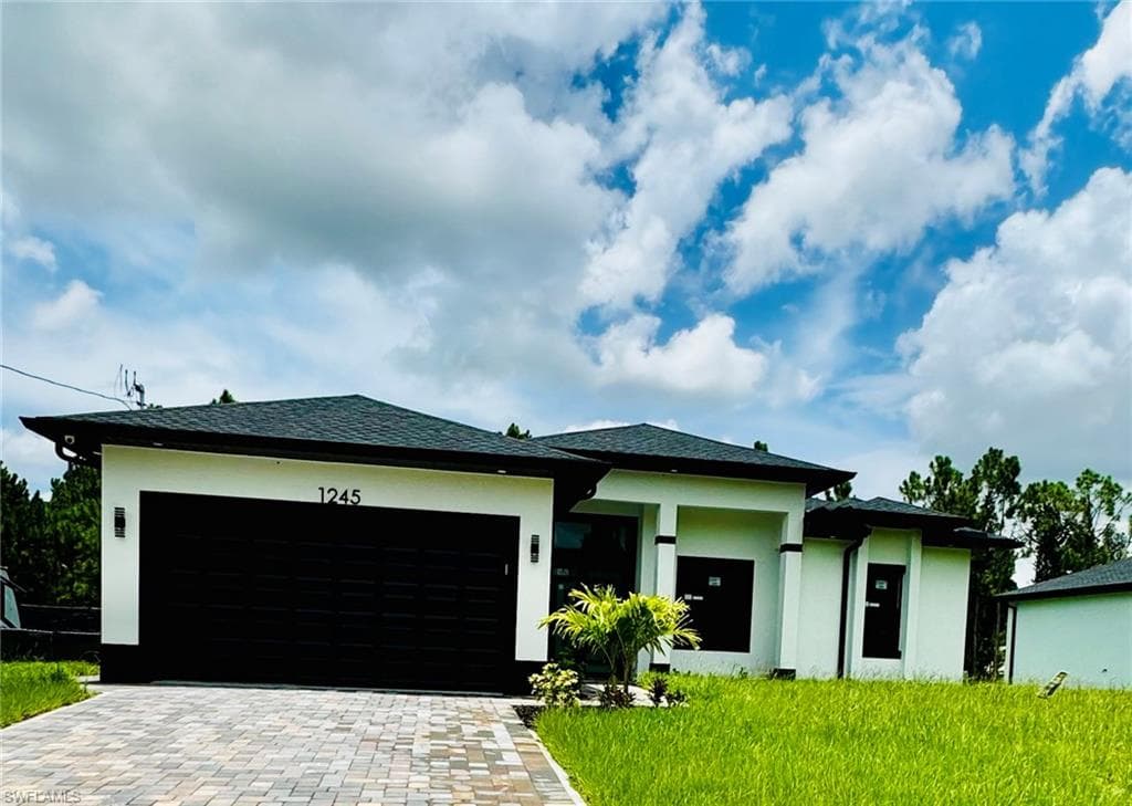1245 Earnest St E, Lehigh Acres, FL 33974-2