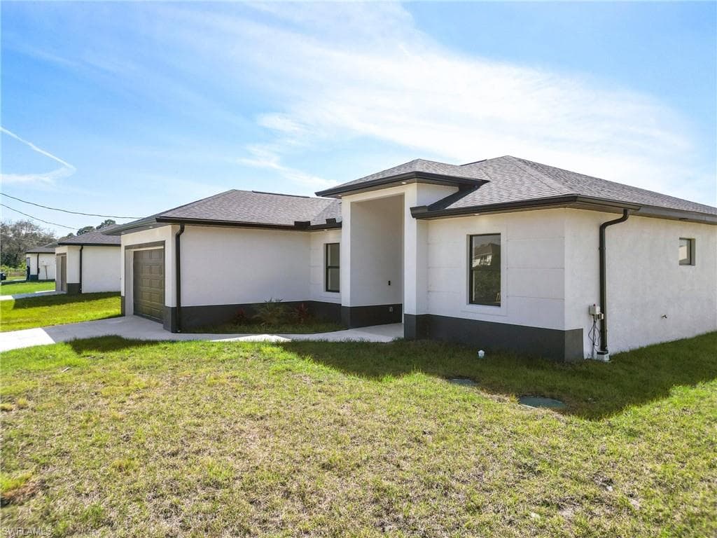 853 Frederick Reid St E, Lehigh Acres, FL 33974-3