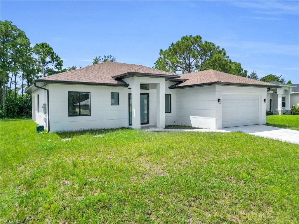 2703 42nd St W, Lehigh Acres, FL 33971-3