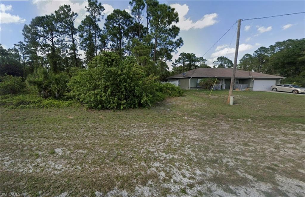 1041 Milwaukee Blvd, Lehigh Acres, FL 33974-4