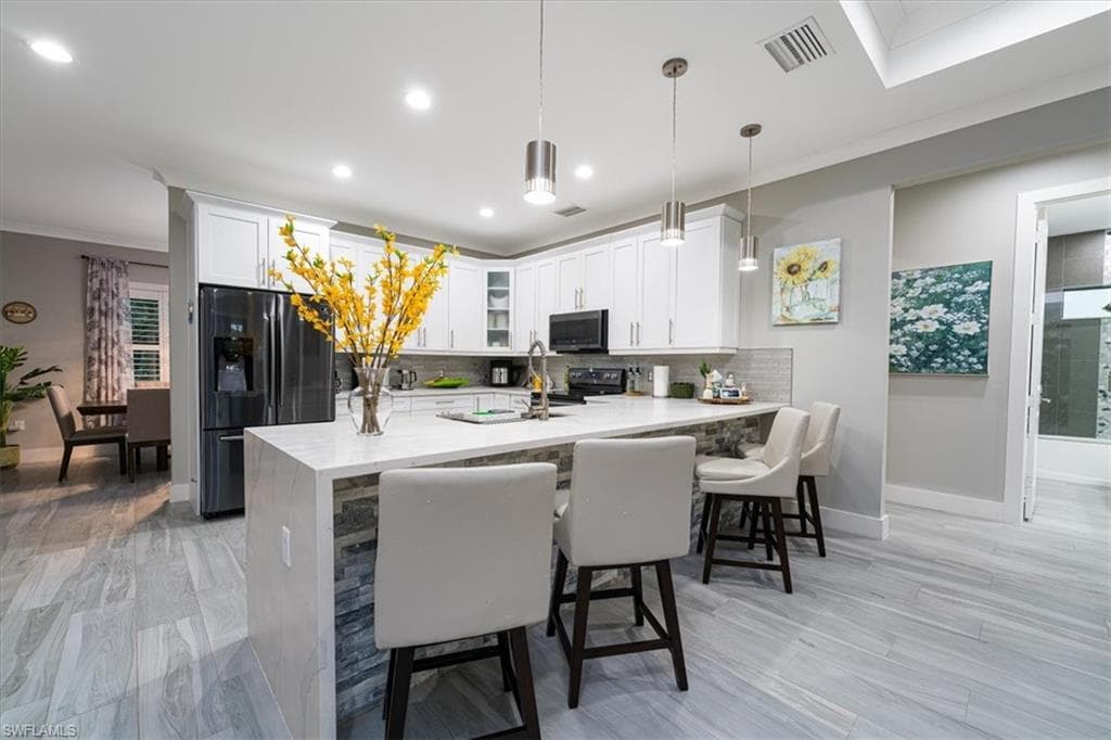 328 16th Ave NW, Naples, FL 34120-15