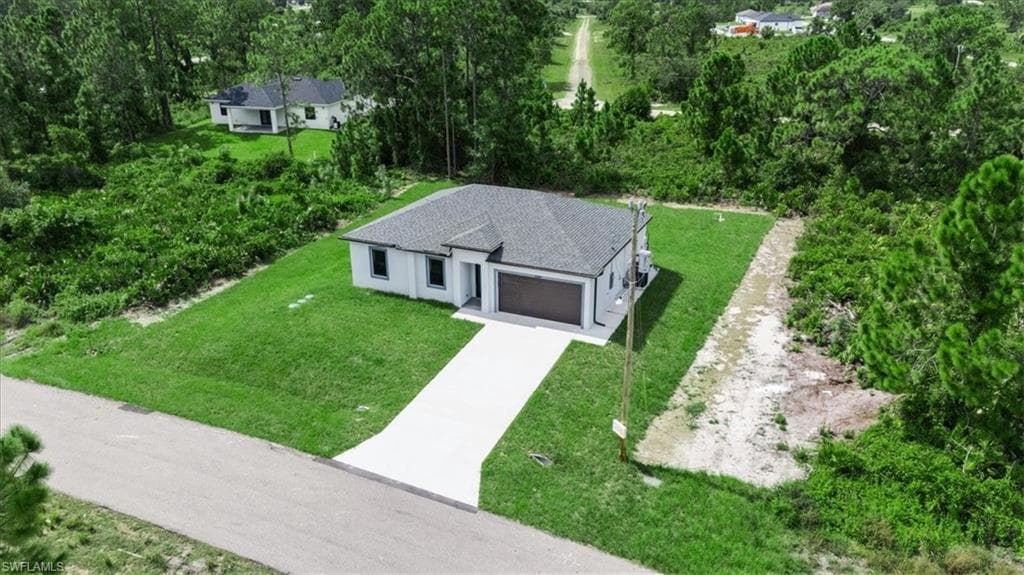 1144 Mobley St E, Lehigh Acres, Fl 33974-33