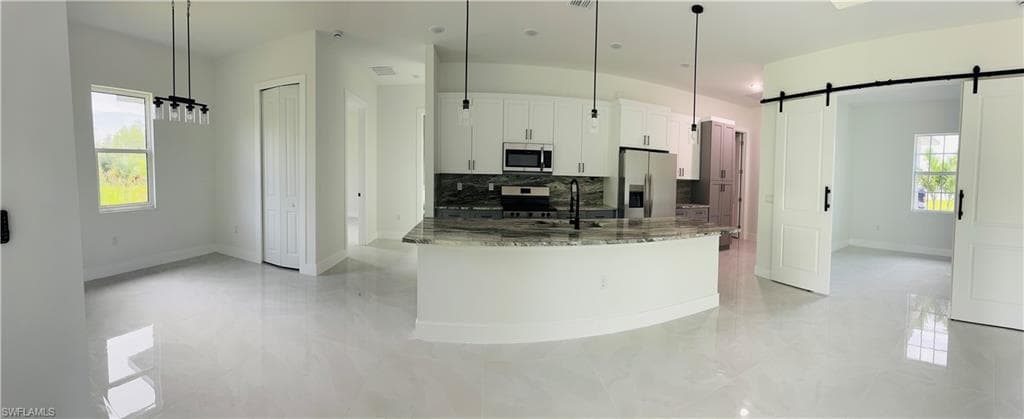 1143 Rachel St E, Lehigh Acres, FL 33974-3